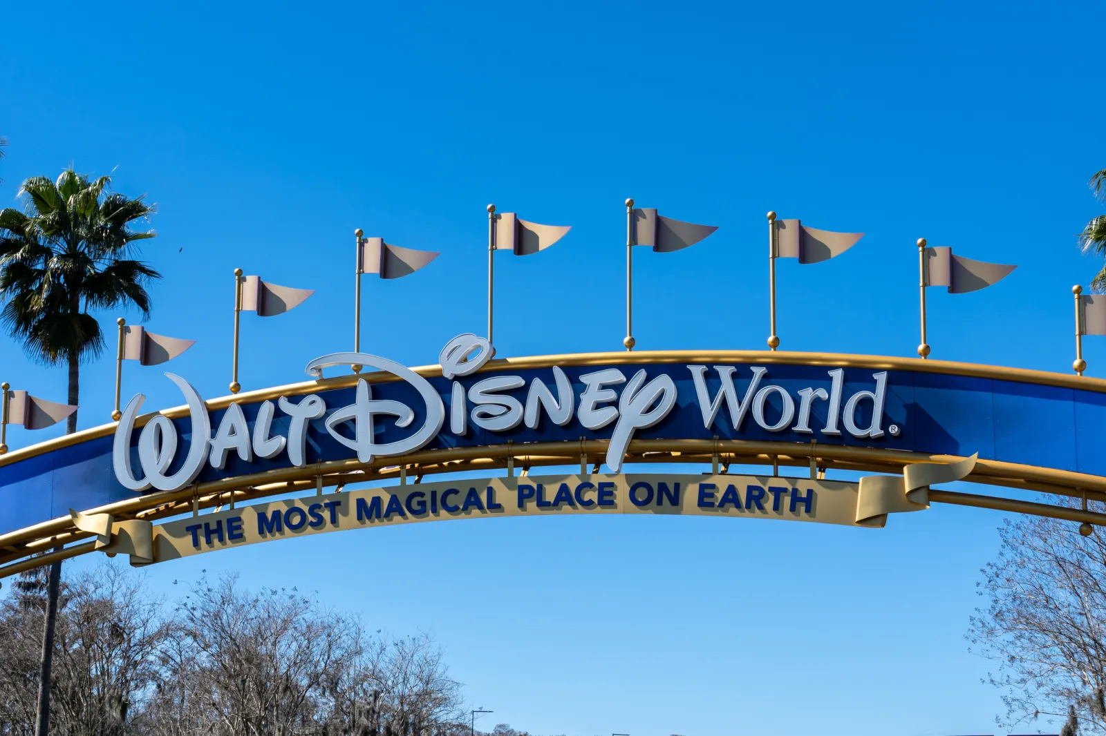 Stock image: the Walt Disney World arch gate is seen on the road in Orlando, Florida,