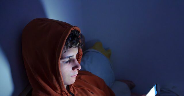 Sullen-teen-on-phone-640x335.jpg